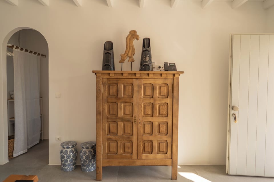 Deluxe Quadruple Room, Pool View | Minibar, in-room safe, individually decorated, individually furnished