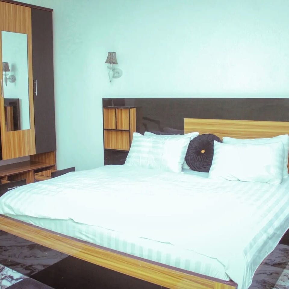 Deluxe Room, Balcony, City View | Desk, laptop workspace, blackout drapes, soundproofing