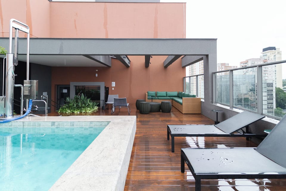 Outdoor pool, pool umbrellas, sun loungers