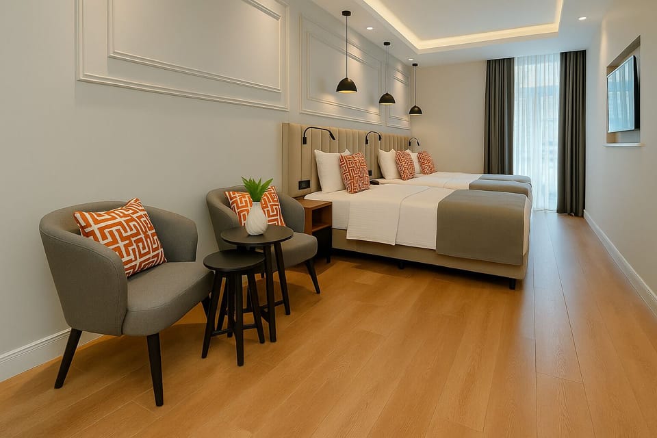 Quadruple Room | Minibar, in-room safe, soundproofing, iron/ironing board