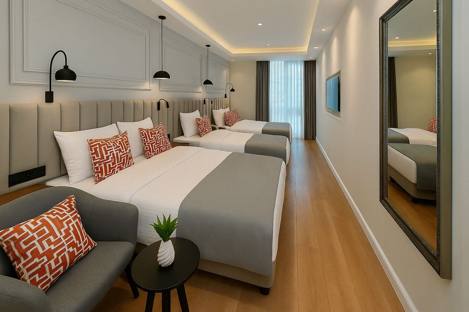 Quadruple Room | Minibar, in-room safe, soundproofing, iron/ironing board