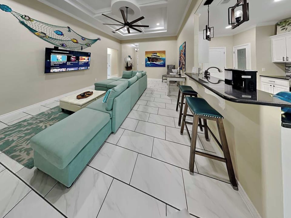 Living Room - Sectional Sofa + Smart TV