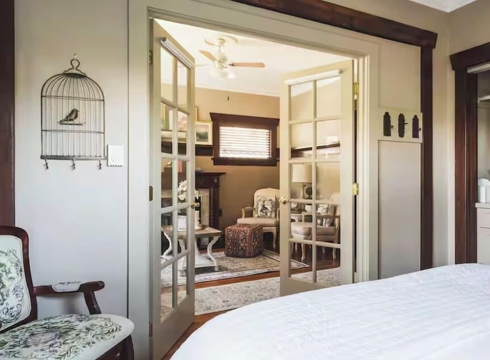 Bedroom french doors open to the living room.