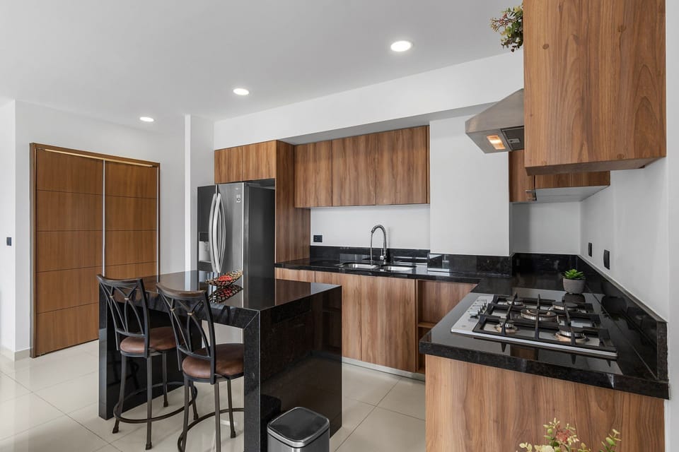Junior Apartment | Private kitchen | Coffee/tea maker, full-size fridge, microwave, oven
