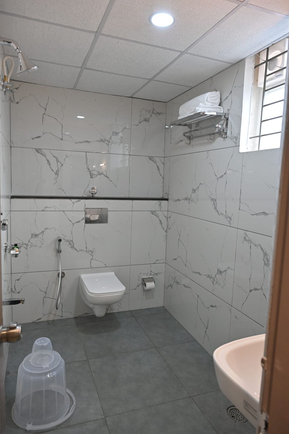 Shower, free toiletries, hair dryer, slippers
