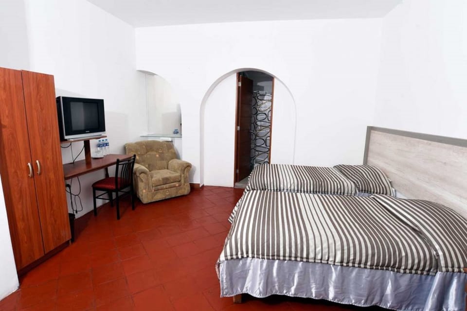 Standard Twin Room, Courtyard View | In-room safe, desk, WiFi (free), bed sheets