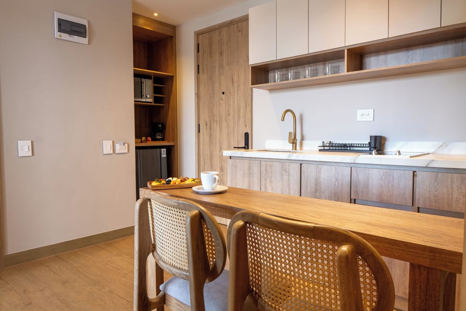 Deluxe Suite, 2 Bedrooms, Balcony, City View | Private kitchen | Mini-fridge, coffee/tea maker