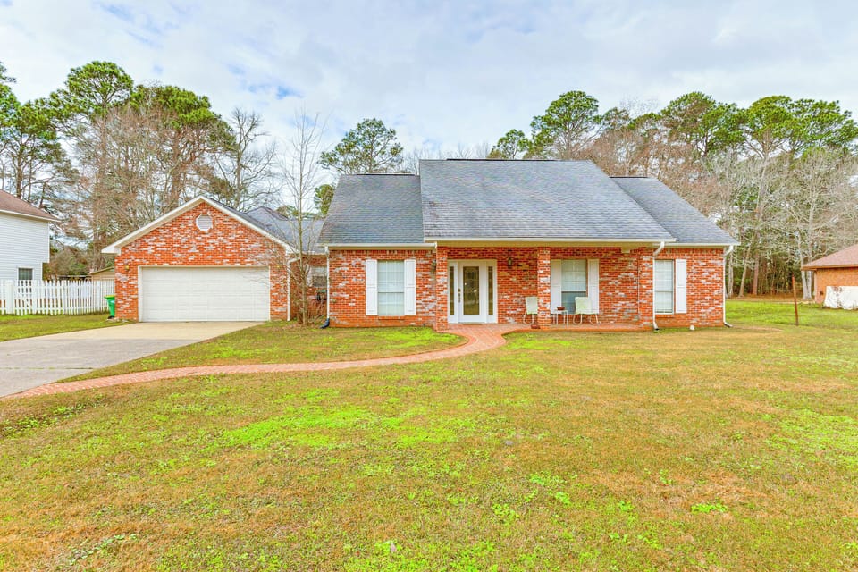 Property Exterior | Single-Story Home | Expansive Yard w/ Pond