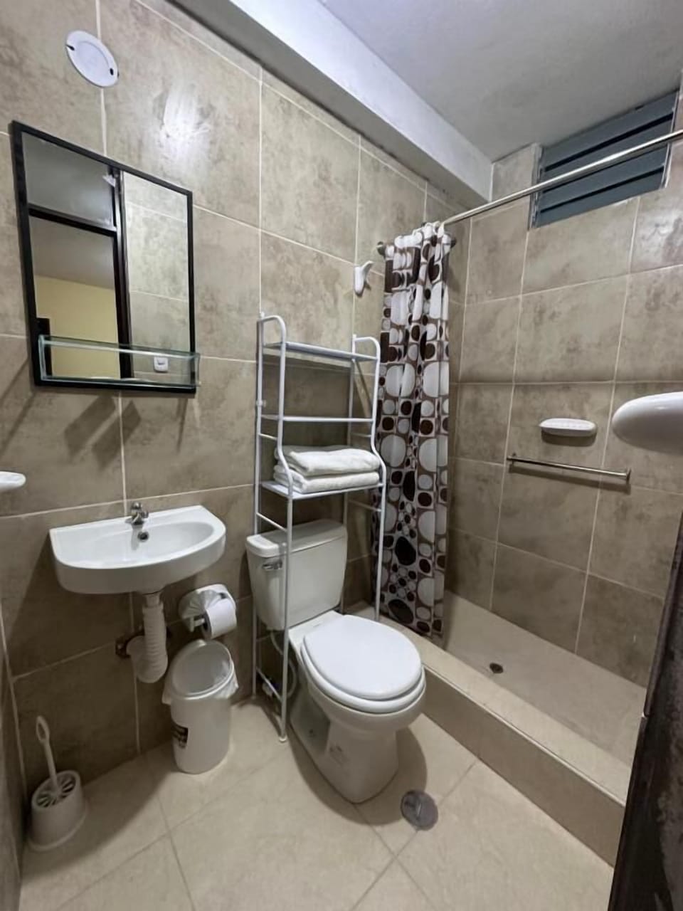 Shower, towels, soap, toilet paper