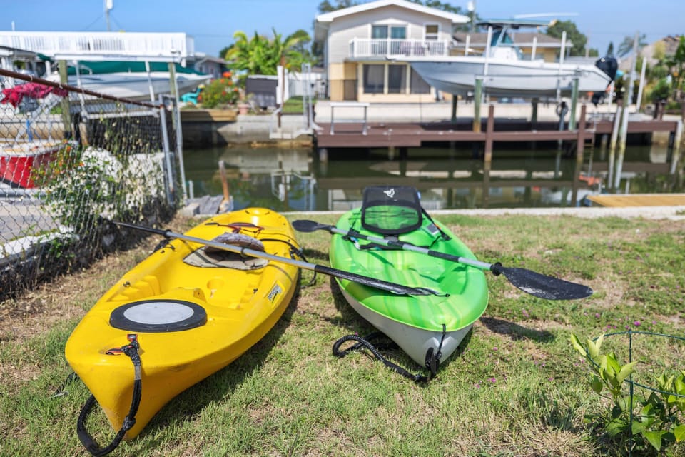 Kayaks with paddles and life jackets