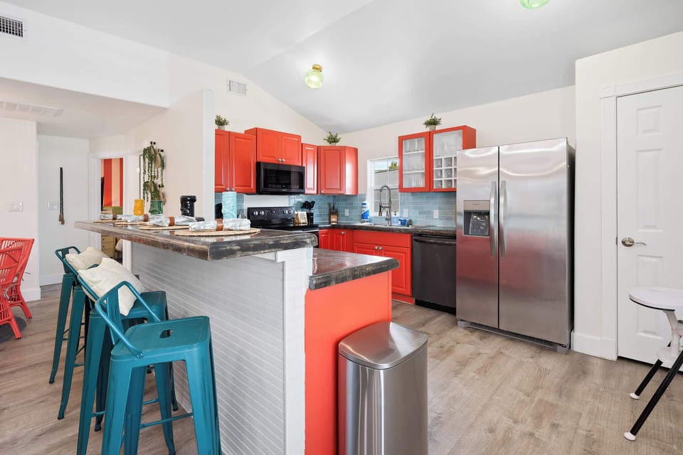 Cook in style! Our fully stocked kitchen features a large island, high-end appliances, and ample cabinetry for all your culinary creations.