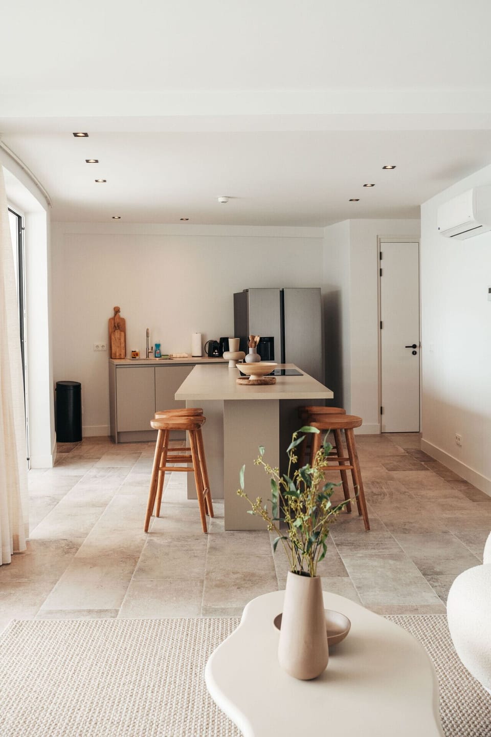 Modern amenities at your fingertips! This is the kitchen of One Mambo 21, complete with a spacious island and all the appliances you need to create delicious meals.