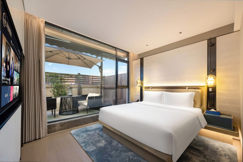 Luxury Suite, Private Bathroom, Garden View | Living area | LCD TV, smart speakers