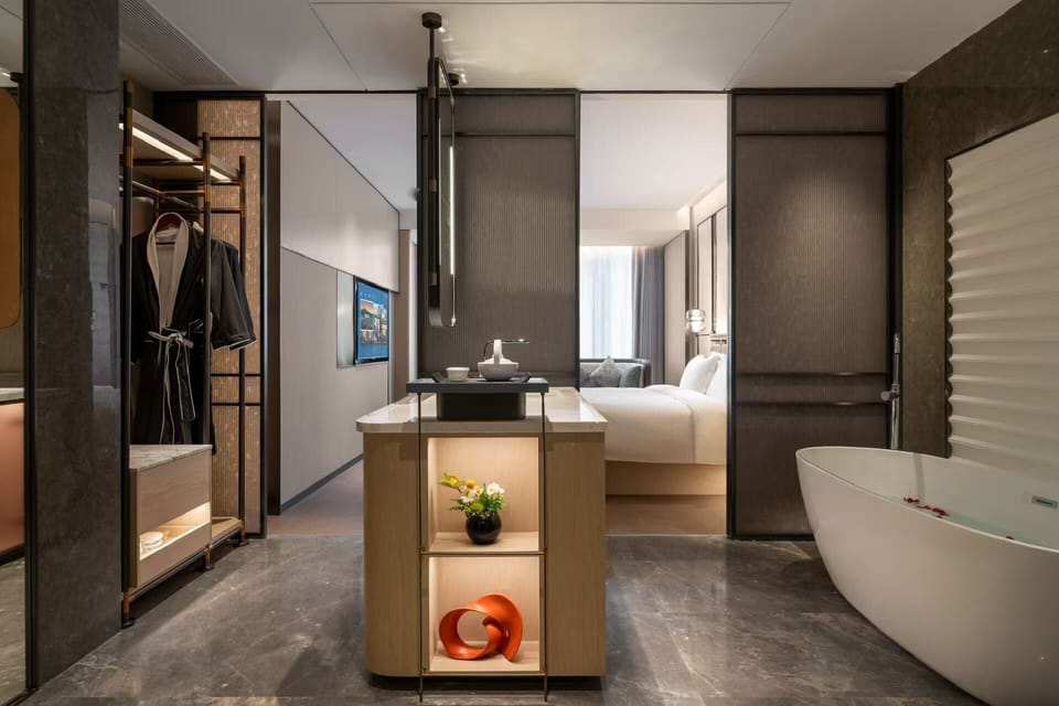 Deluxe Double Room, Park View | Bathroom | Rainfall showerhead, free toiletries, hair dryer, bathrobes