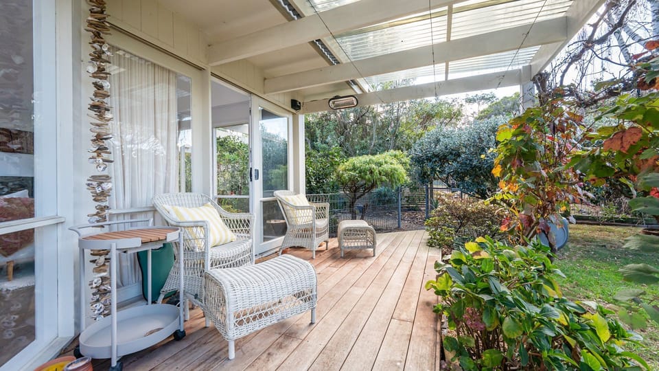 Outdoor seating area with garden view 