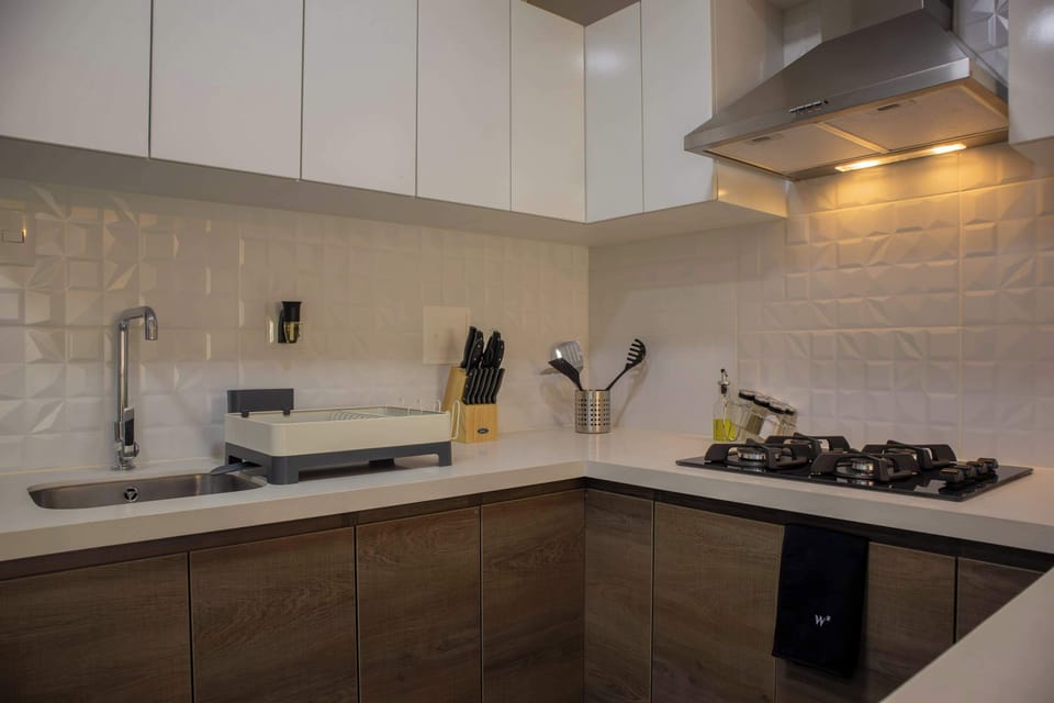 Bright open kitchen with breakfast bar.