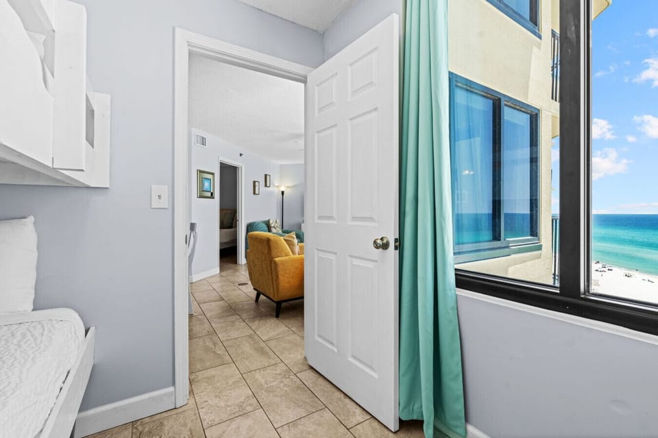 Enjoy natural light and breathtaking views even from the bunk room, just steps away from the main living area.