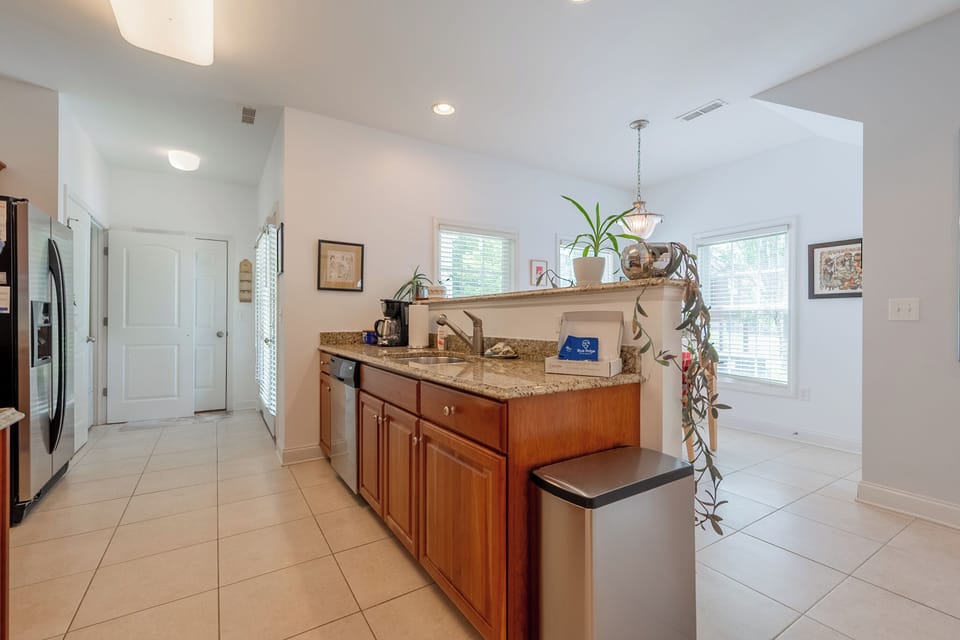 Fully equipped kitchen with modern appliances and generous counter space for family meals.