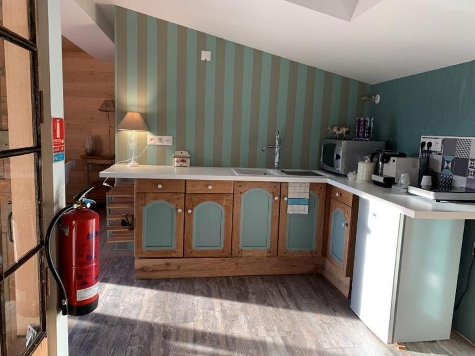 Apartment, Balcony, Resort View | Private kitchen | Highchair