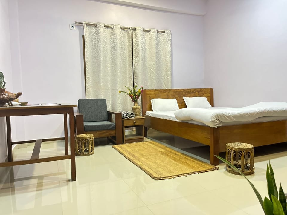 Desk, laptop workspace, WiFi (free), bed sheets