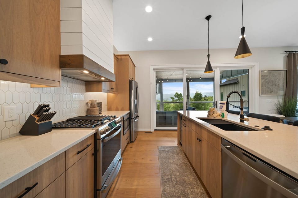 Granite Countertops, Gas Stove, and Stainless Appliances