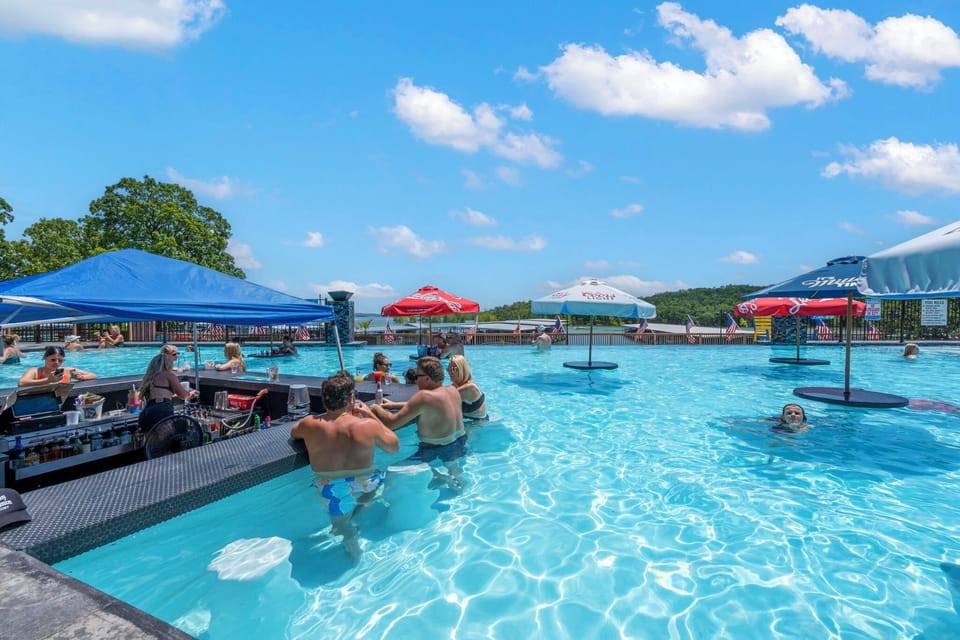 Sip, swim, and soak up the sun! Chill at the swim-up bar in Rock Lane's brand-new infinity pool — the perfect spot for summer cocktails with friends and unforgettable lake views.