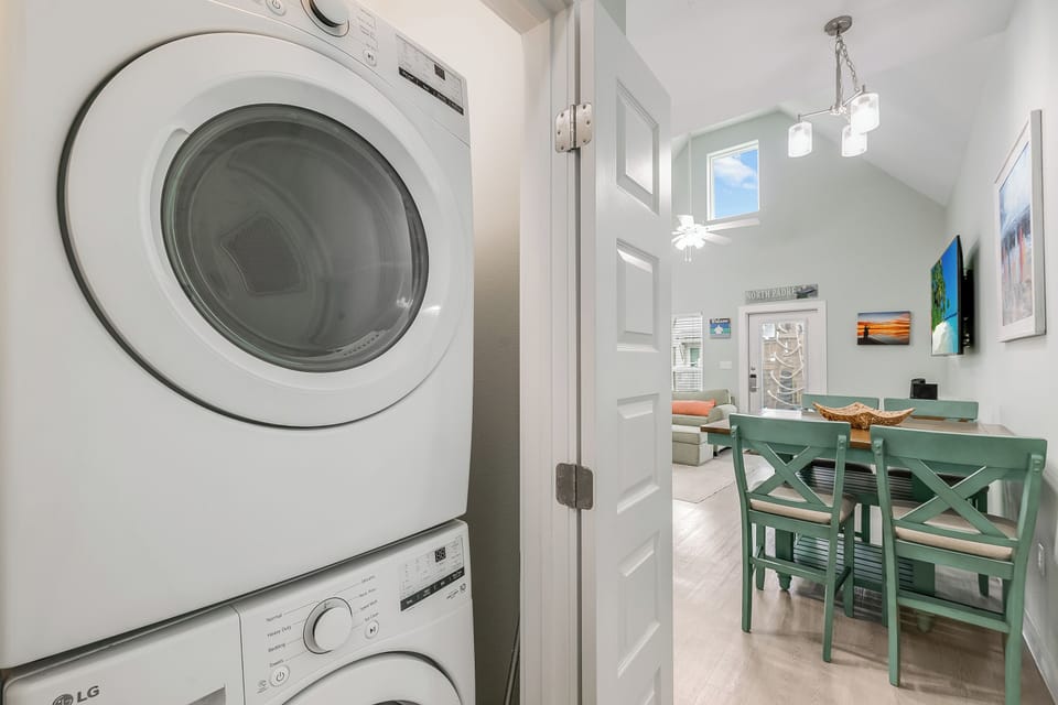 Your in-unit washer and dryer make packing light a breeze, while the charming dining space awaits your morning coffee.