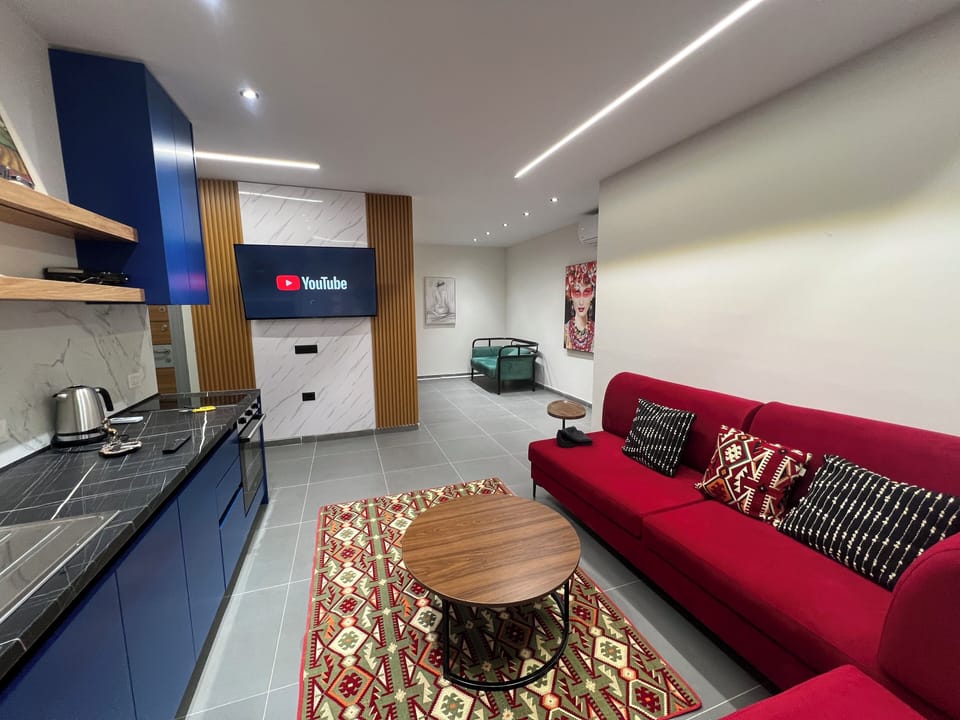 Comfort Studio Suite, 1 Bedroom, City View | Desk, laptop workspace, soundproofing, iron/ironing board