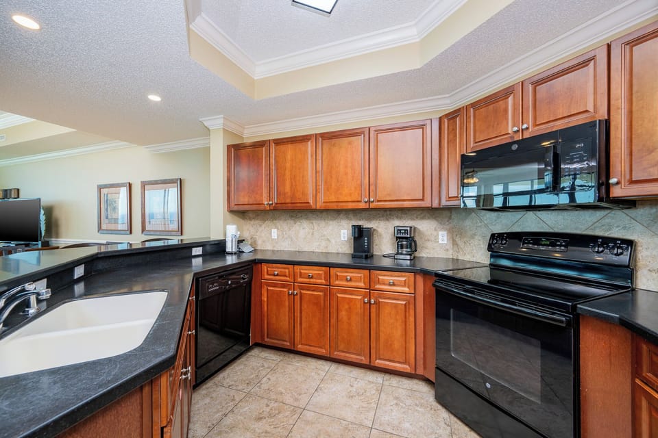 Create culinary delights in this spacious kitchen, where ample counter space inspires family meal prep