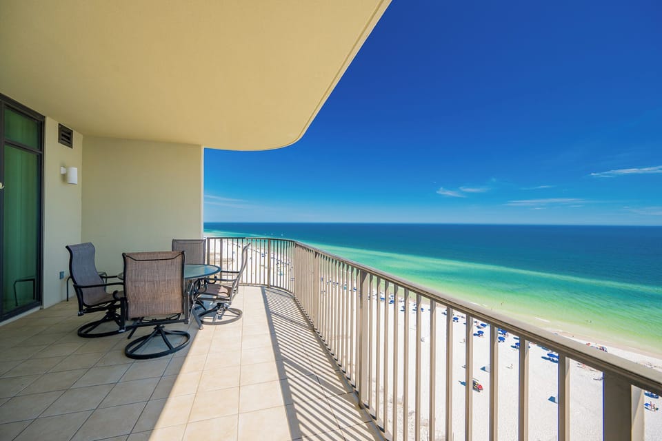 Watch the coastline stretch into the distance and the horizon meet the sky from your balcony while you soak up the sun