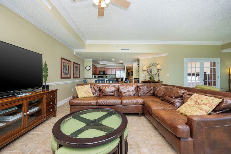 Relax in the cozy living area, perfect for streaming your favorite shows while enjoying beautiful coastal views