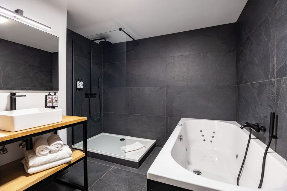 Suite | Desk, laptop workspace, blackout drapes, iron/ironing board
