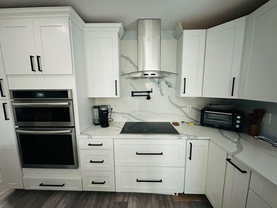 Induction Oven and built in pot filler faucet.