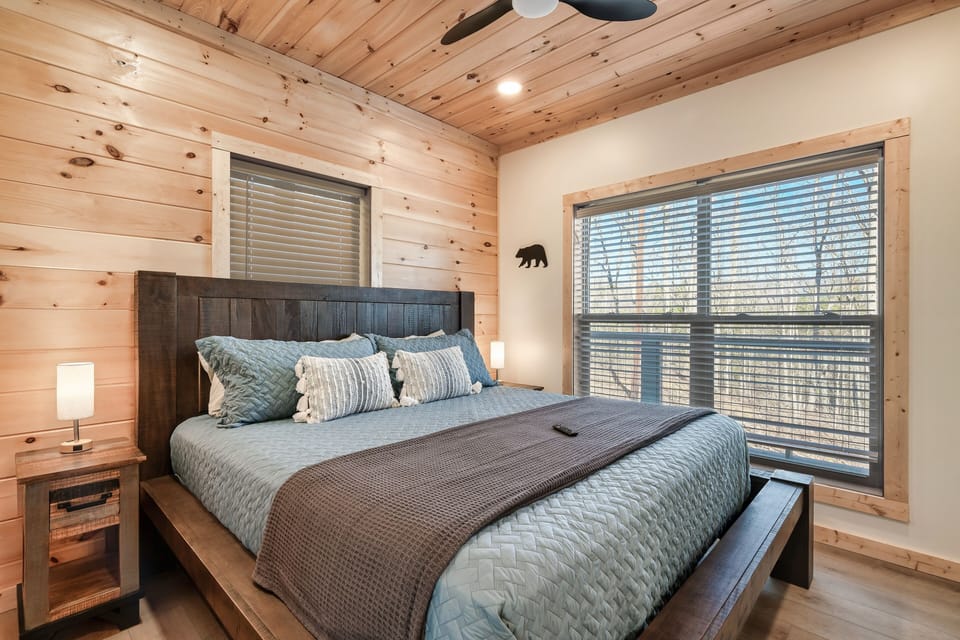 Main level master bedroom has a king bed