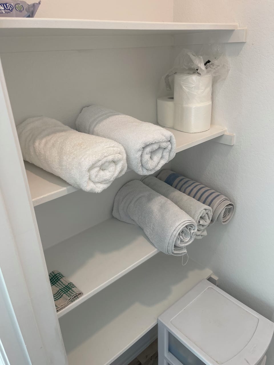 Extra storage in master bath for towels and supplies