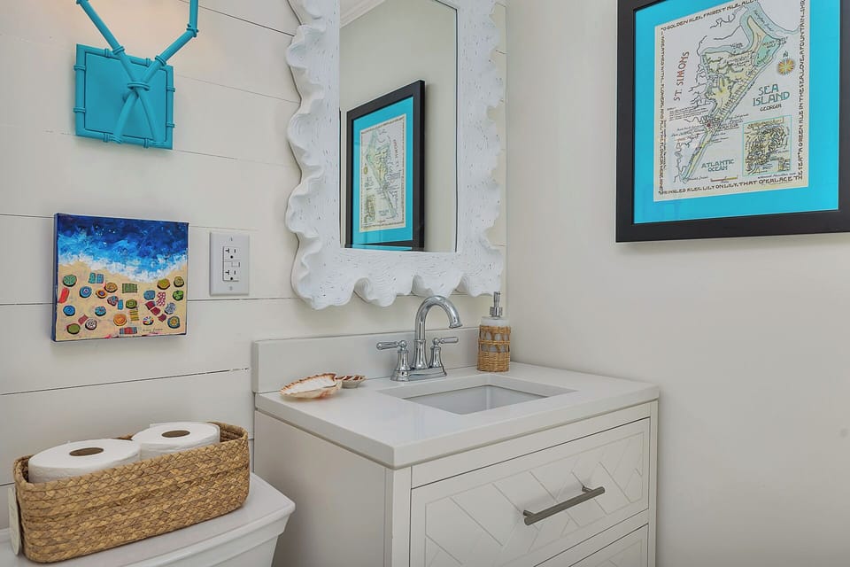 The touches of color bring the fun of the coast inside