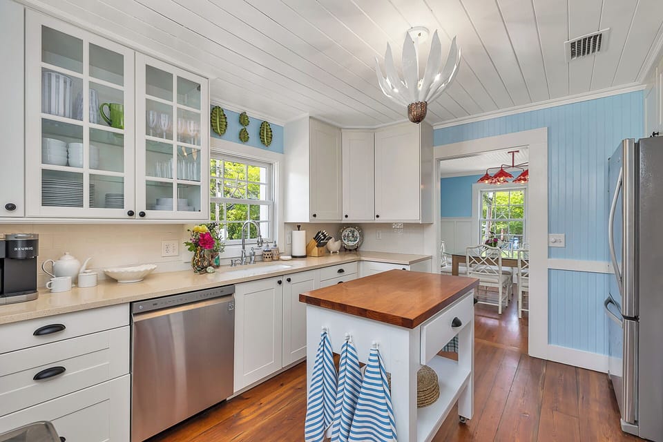 This kitchen chandelier by Stray Dog Design has an extra element of fun