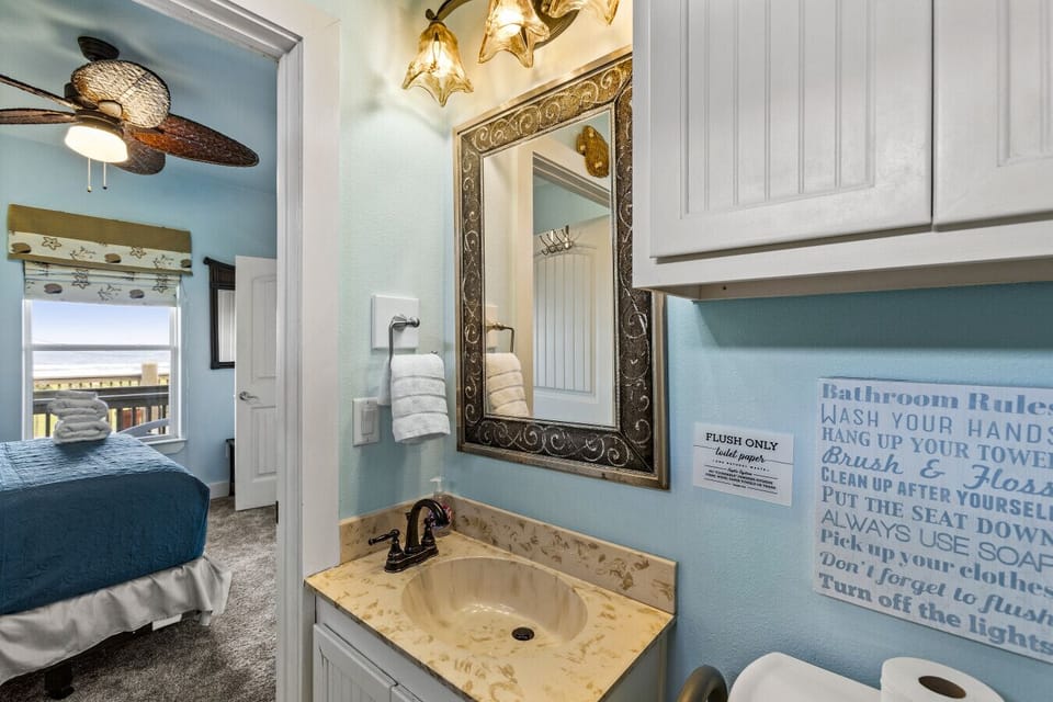 Clean, bright bathroom with full amenities