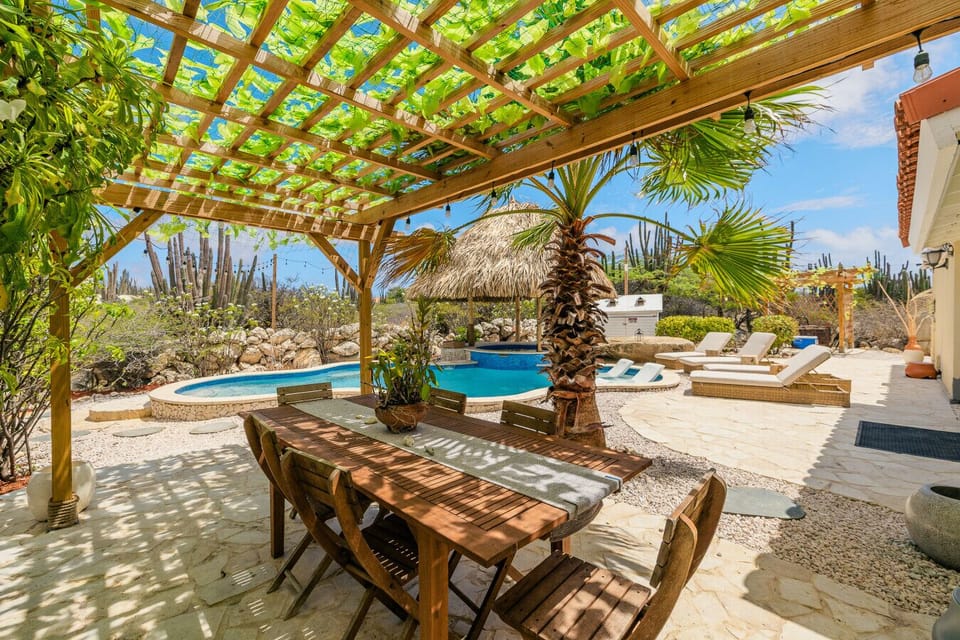 Soothing water feature flowing from the (non-heated) jacuzzi into the pool