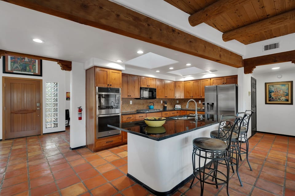 Barstools allow for dining directly at the kitchen island.