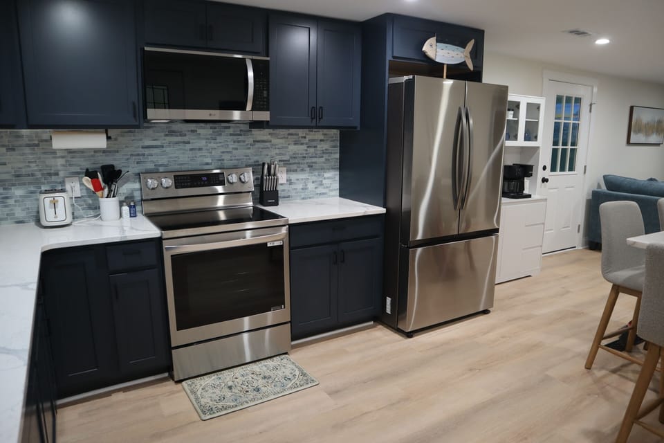 Our beautiful kitchen with quartz countertops.