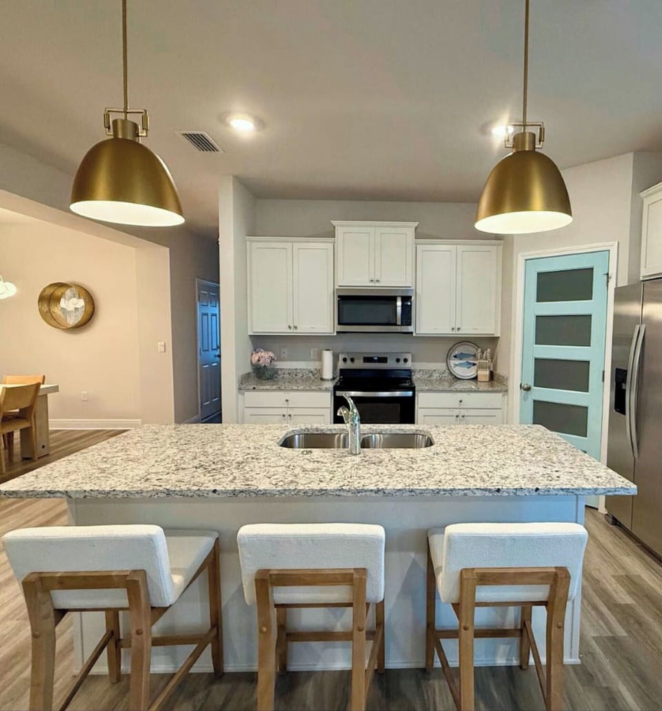 Kitchen island with bar seating—perfect for morning coffee or casual chats.