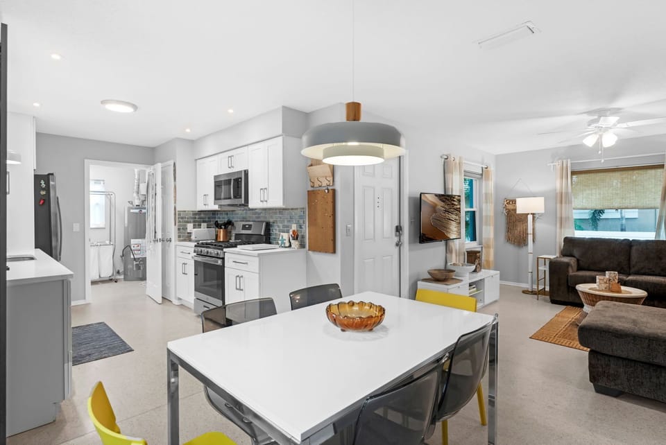 Open floor plan with modern kitchen and dining room
