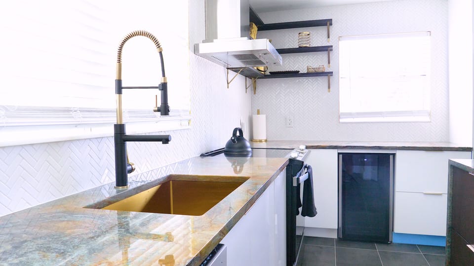 Stylish kitchen with large island and modern finishes