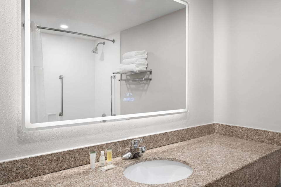 Bathtub, hair dryer, towels