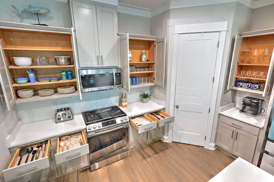 This kitchen is basically a chef`s dream with all those smart storage solutions and that gorgeous gas range ready for you to actually cook something amazing during your stay.