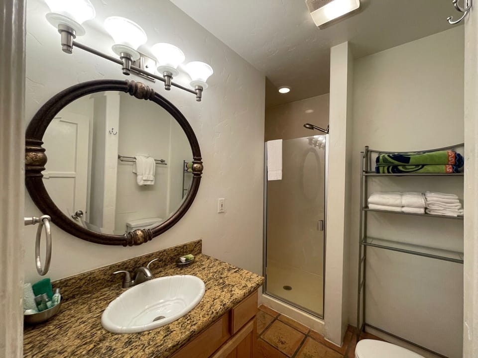 Studio Suite, Kitchenette, Beachside | Bathroom | Shower, hair dryer, towels, soap