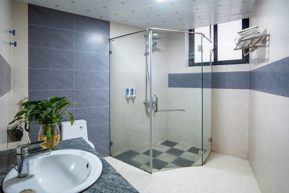 Superior Triple Room | Bathroom | Shower, rainfall showerhead, designer toiletries, hair dryer