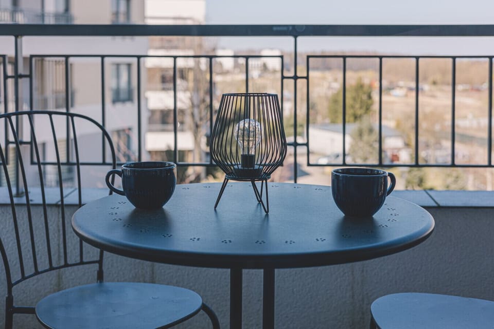 Terrace overlooking the estate – enjoy fresh air relaxation, ideal for morning coffee or sunset dinners.