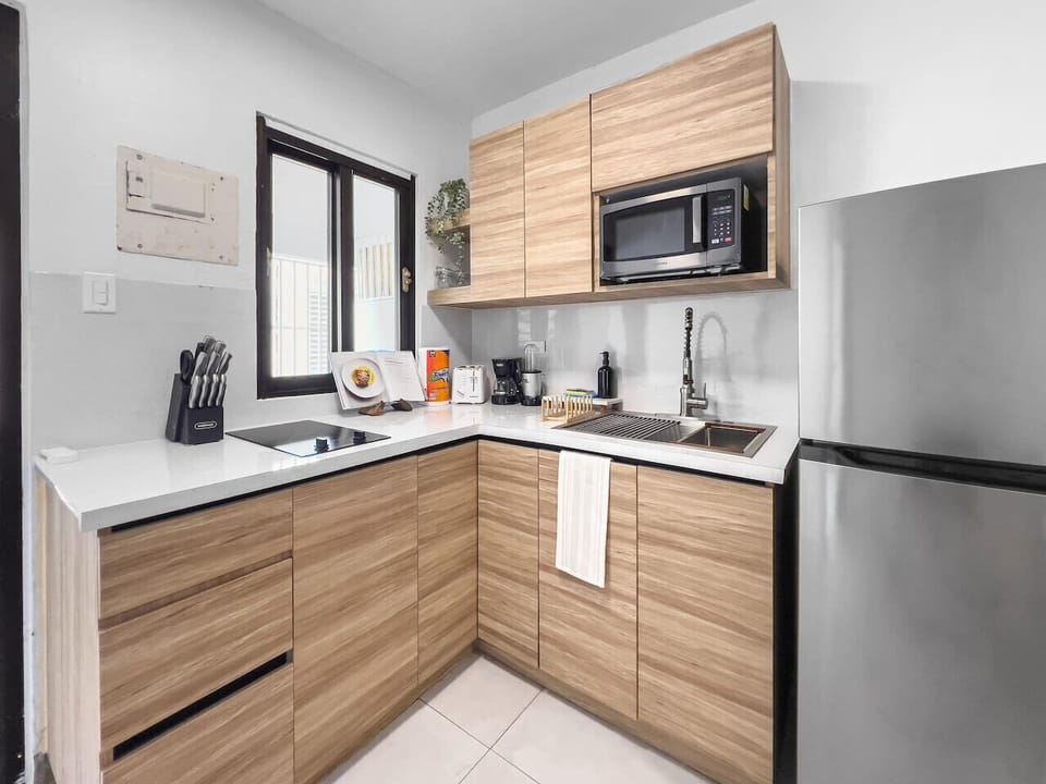 Clean, Practical Kitchen Ready for Your Favorite Meals